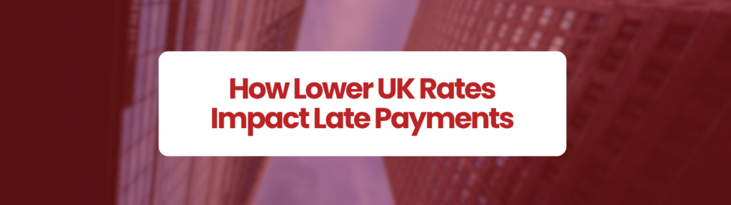 Bold red rectngle with blurred blue buildings in background. White rectangluar box in middle saying ' How Lower UK Rates Impact Late Payments' 