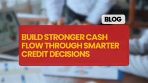 red box in the centre of image with yellow writing. White box with black wrtiting at top right hand corner of red box. Background image of people working on laptops