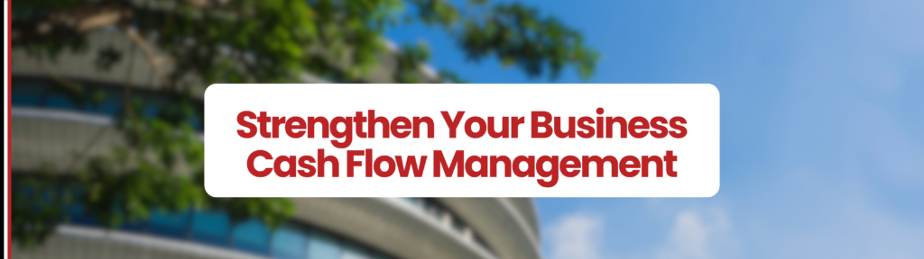 Building with blue skies and green leaves infront of building. White rounded box in the middle of the graphic which says ' Strengthen Your Business Cash Flow Management' 